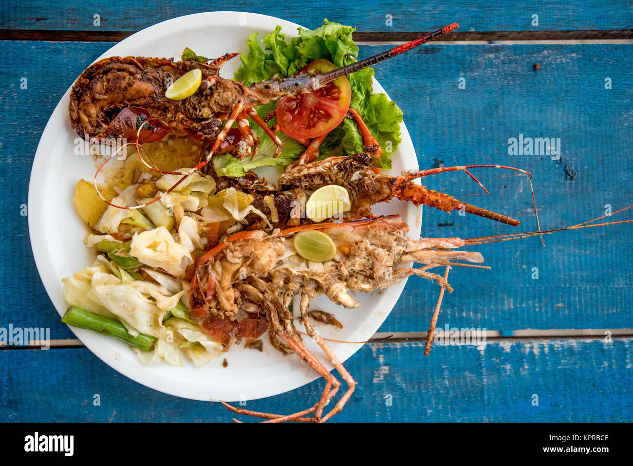 Tasty prepared lobsters and jumbo shrimps Stock Photo