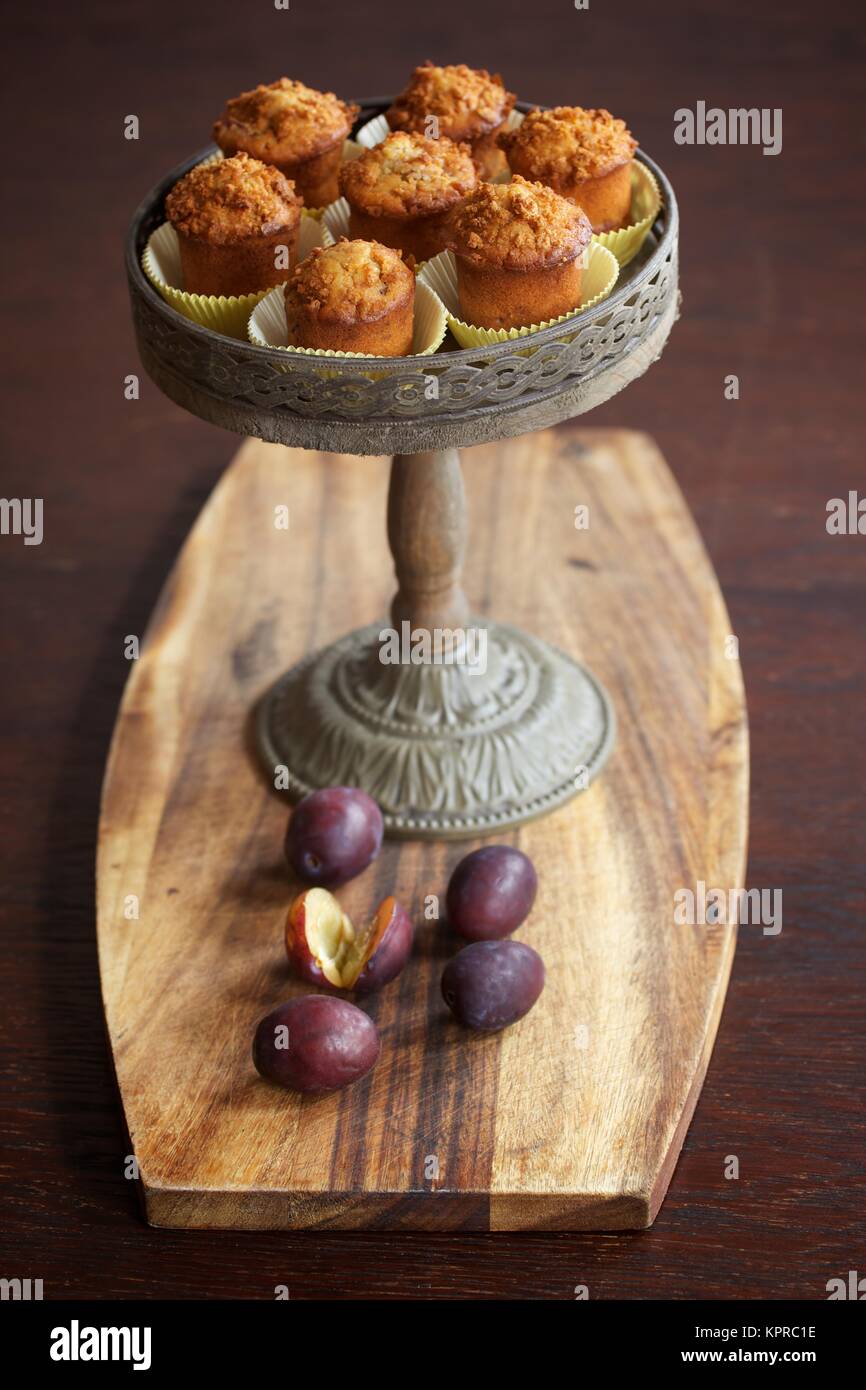Muffins on cake stand Stock Photo Alamy