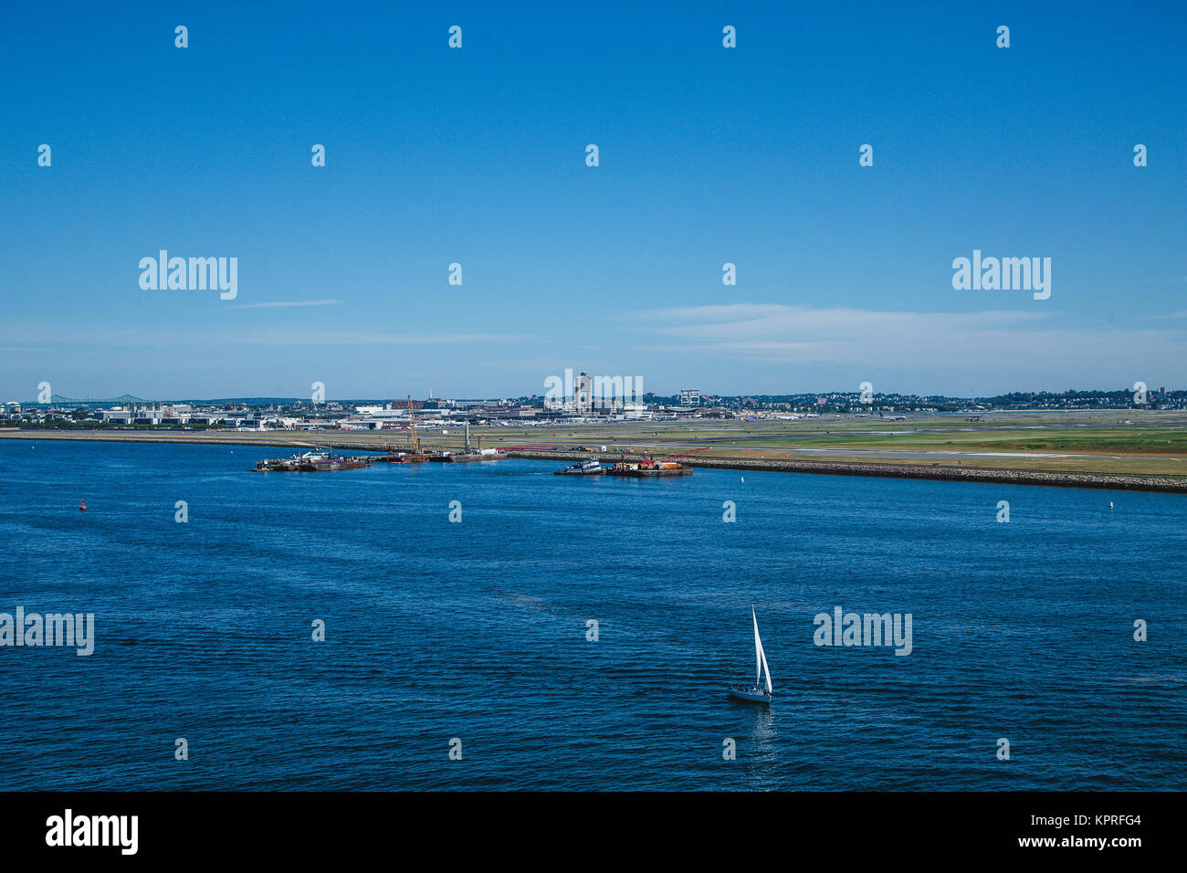 White Sailboat By Logan Airport In Boston Stock Photo Alamy