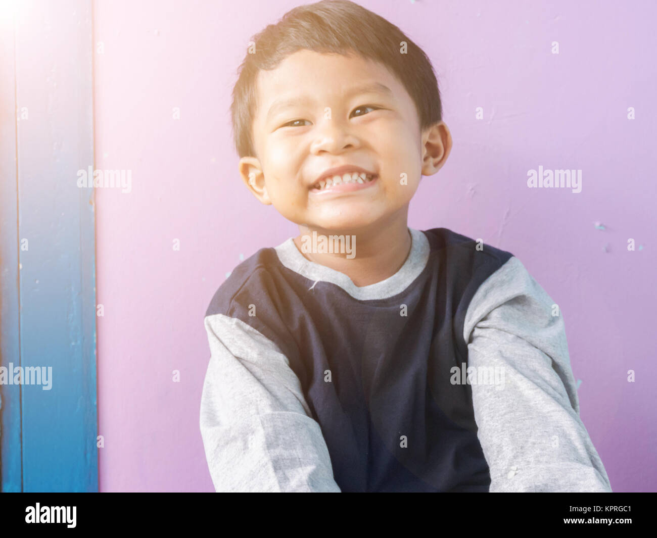 Portrait of Asian boy smiling. Stock Photo