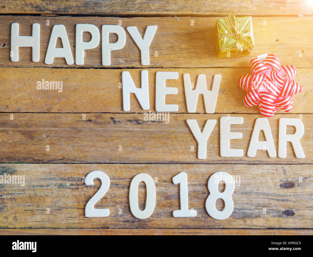 Happy New Year 2018 alphabet on wood background Stock Photo - Alamy