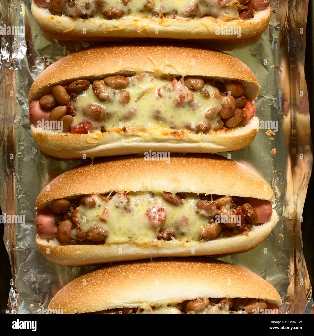 Baked Chili Hot Dog Stock Photo - Alamy