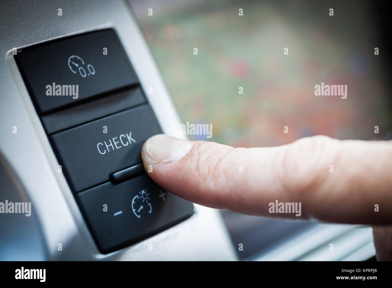 Car check button Stock Photo - Alamy