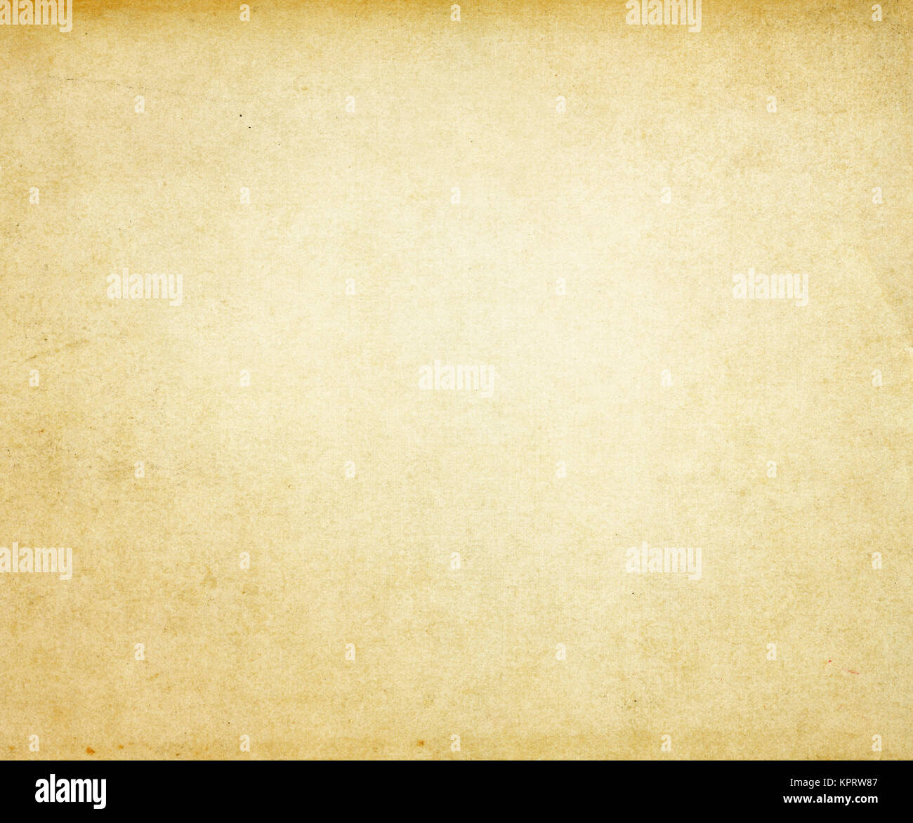 Aging paper background. Natural old paper texture for the design. Stock Photo