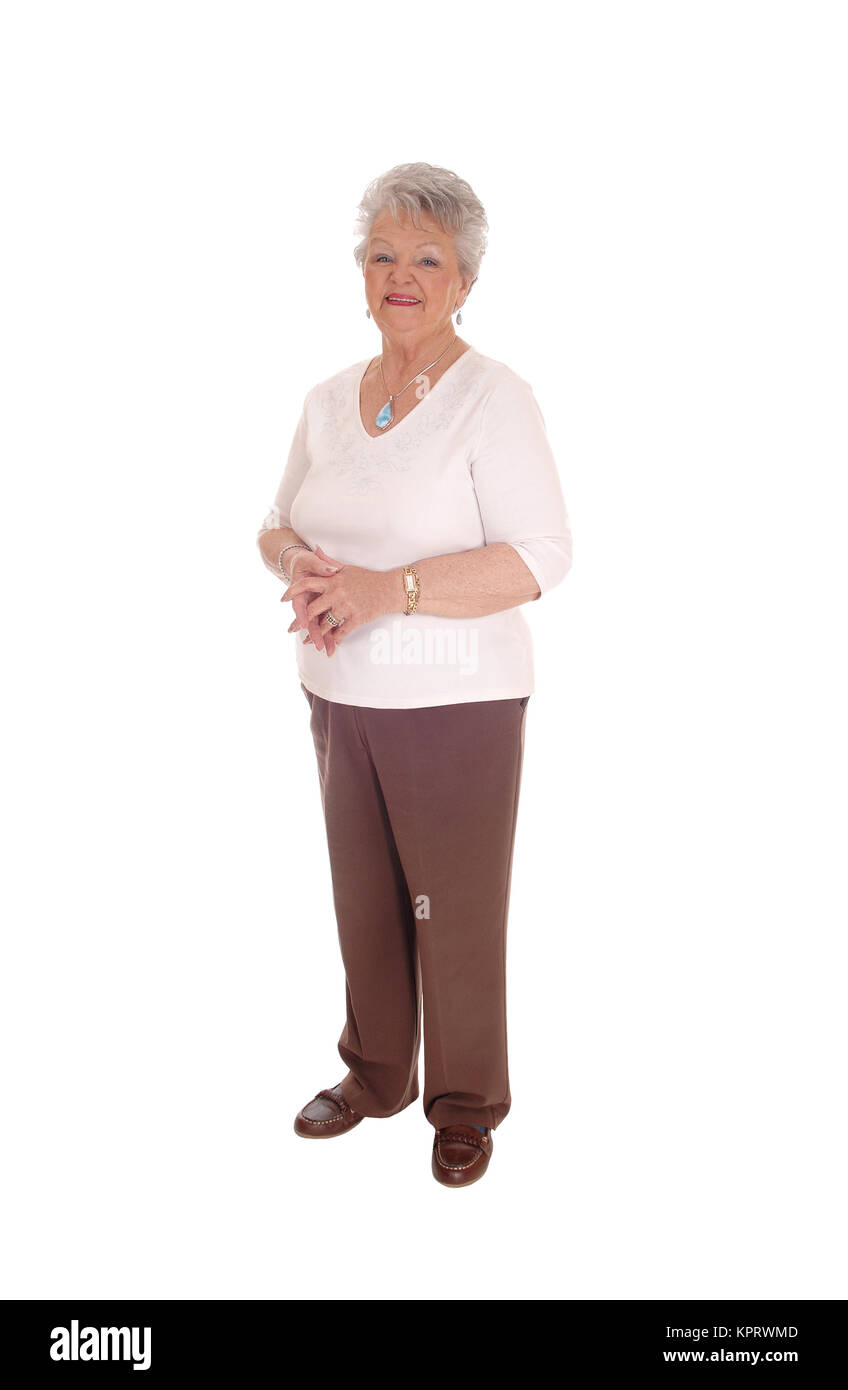 Elderly woman standing for white background. Stock Photo