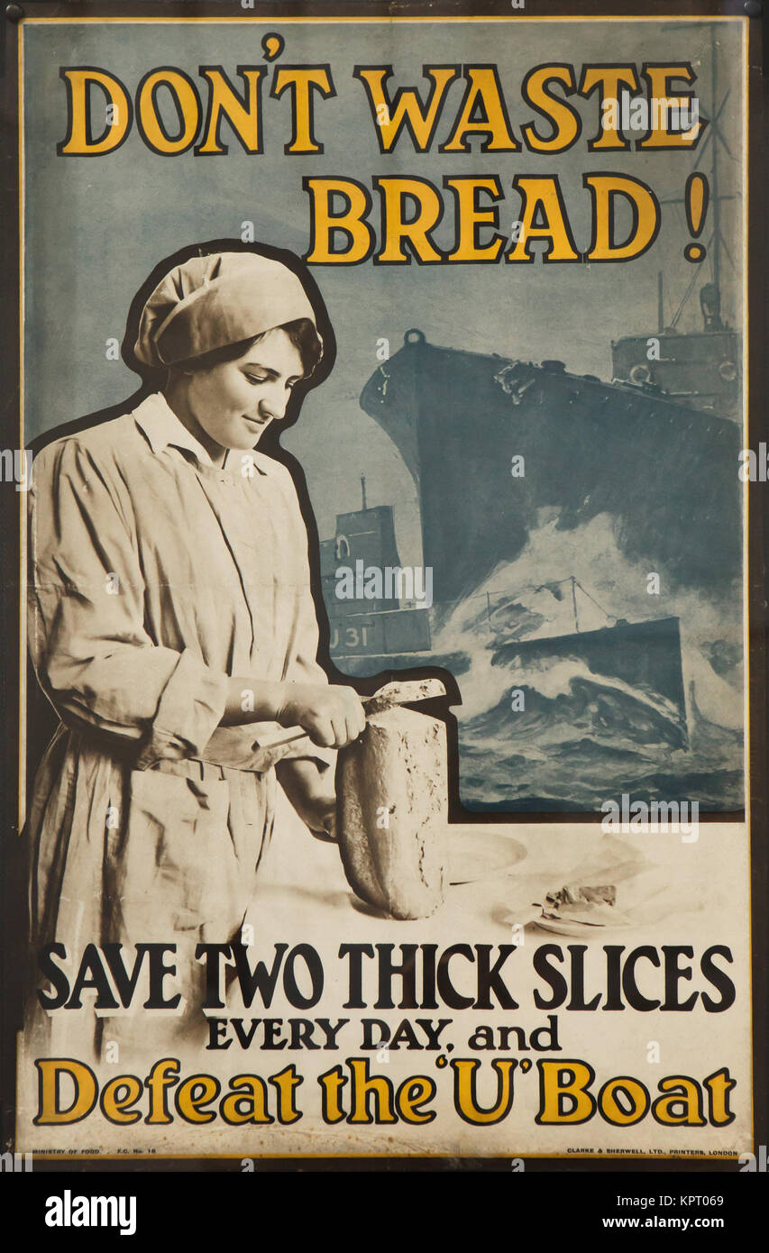 Don't waste bread! Save two thick slices every day and defeat the U-boat. Poster from 1917 by an unknown American illustrator on display at the poster exhibition in the South Bohemian Gallery (Alšova jihočeská galerie) in Hluboká nad Vltavou in South Bohemia, Czech Republic. The exhibition devoted to the posters of the time of the First World War runs till 1 October 2017. Stock Photo