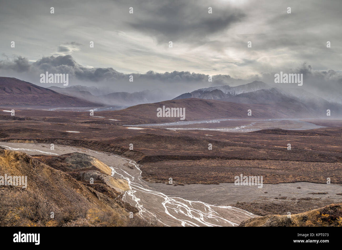 Storm approaching in Denali National Park and Preserve taken in fall (autumn) showing tundra in fall colors Stock Photo