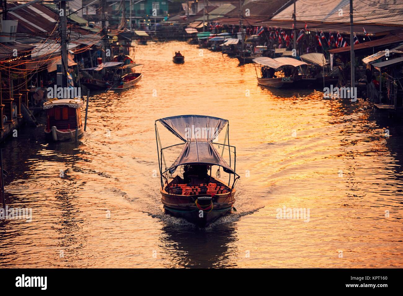 Traditional old floating market Amphawa in Ratchaburi Province near Bangkok, Thailand. Stock Photo