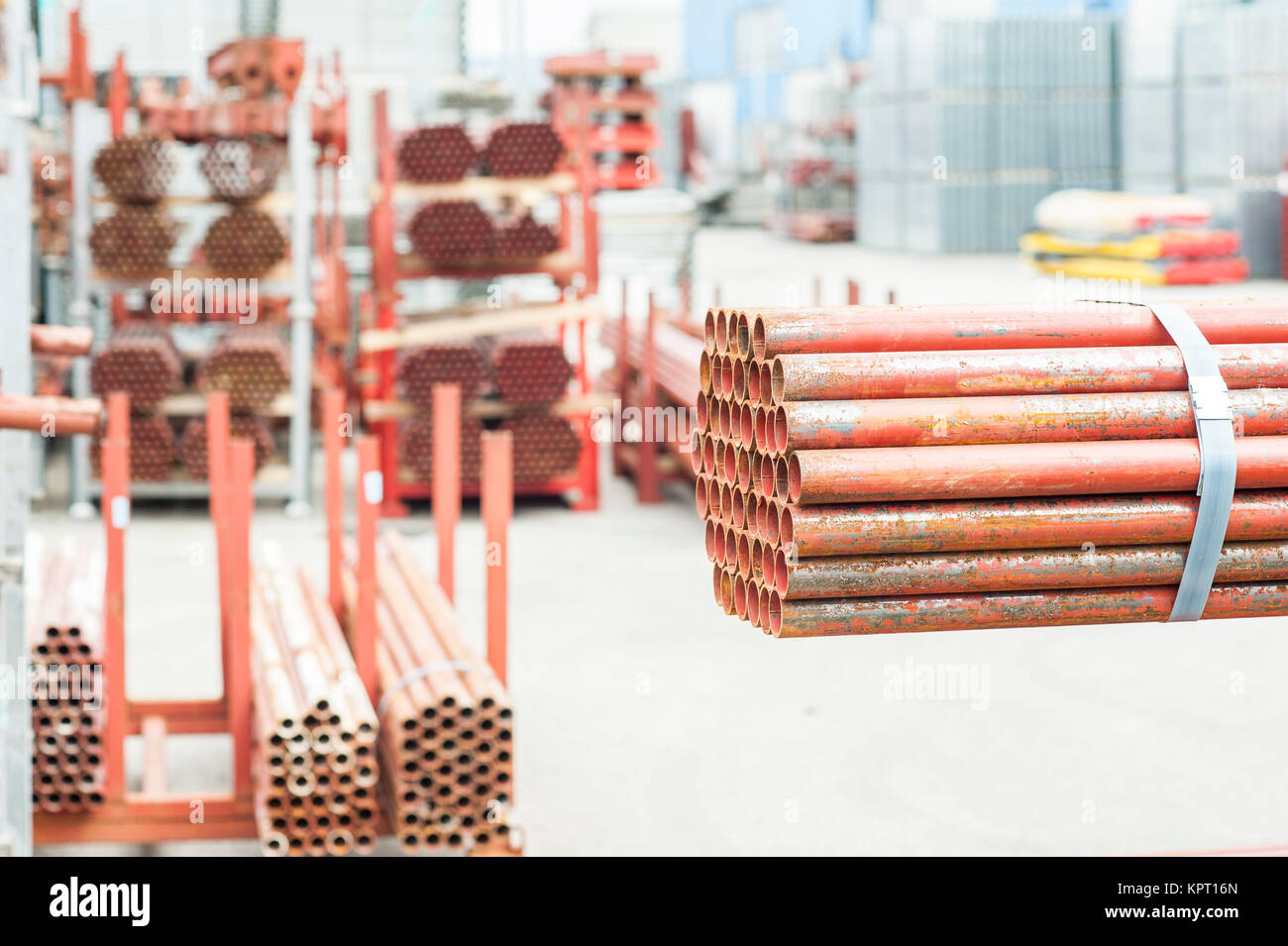Stack of steel pipes for scaffolding in warehouse Stock Photo Alamy