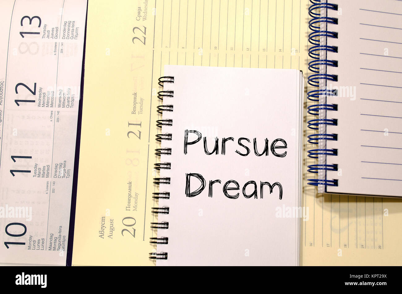Pursue dream write on notebook Stock Photo Alamy