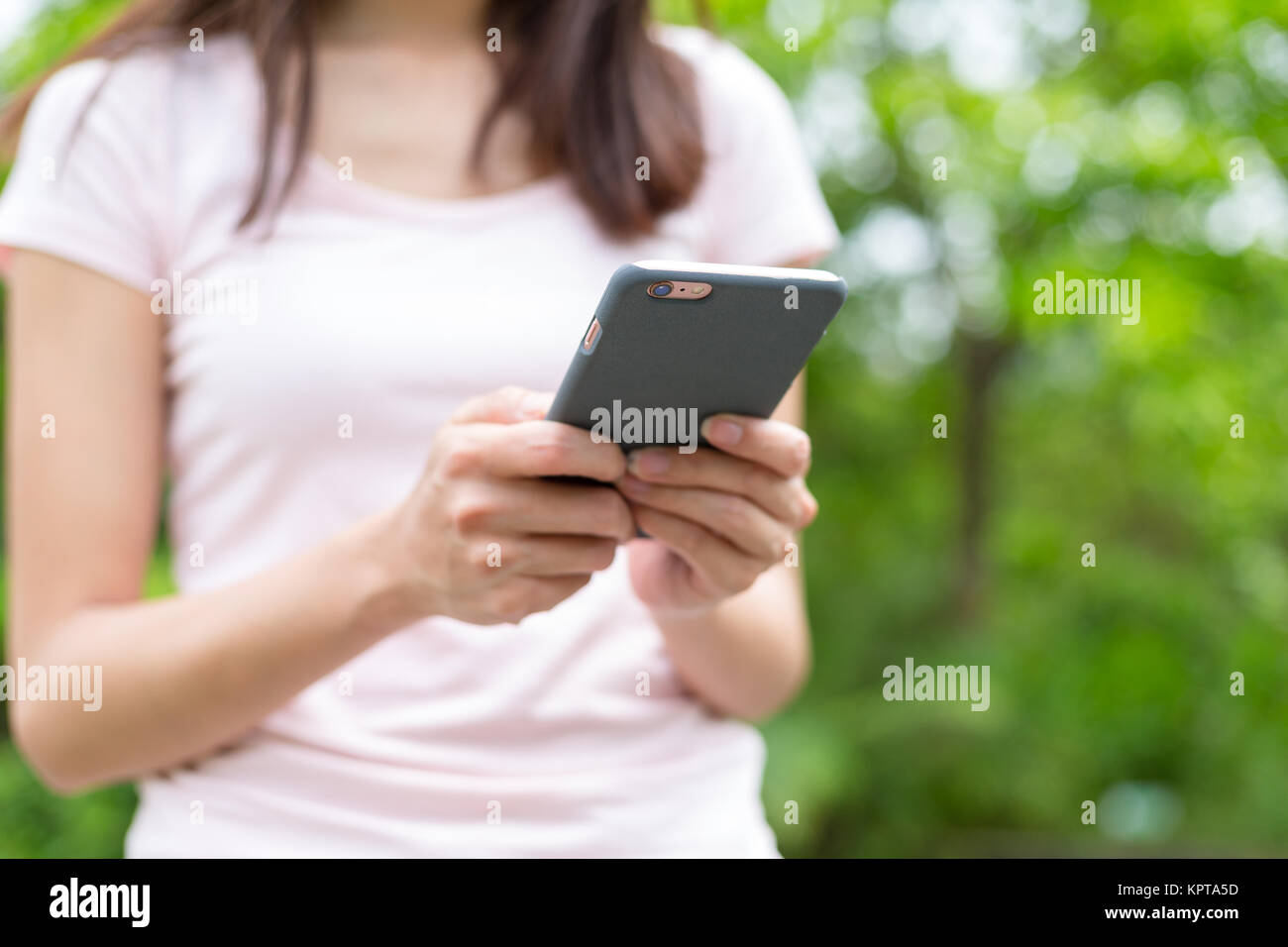 Woman using mobile texting messages Stock Photo - Alamy