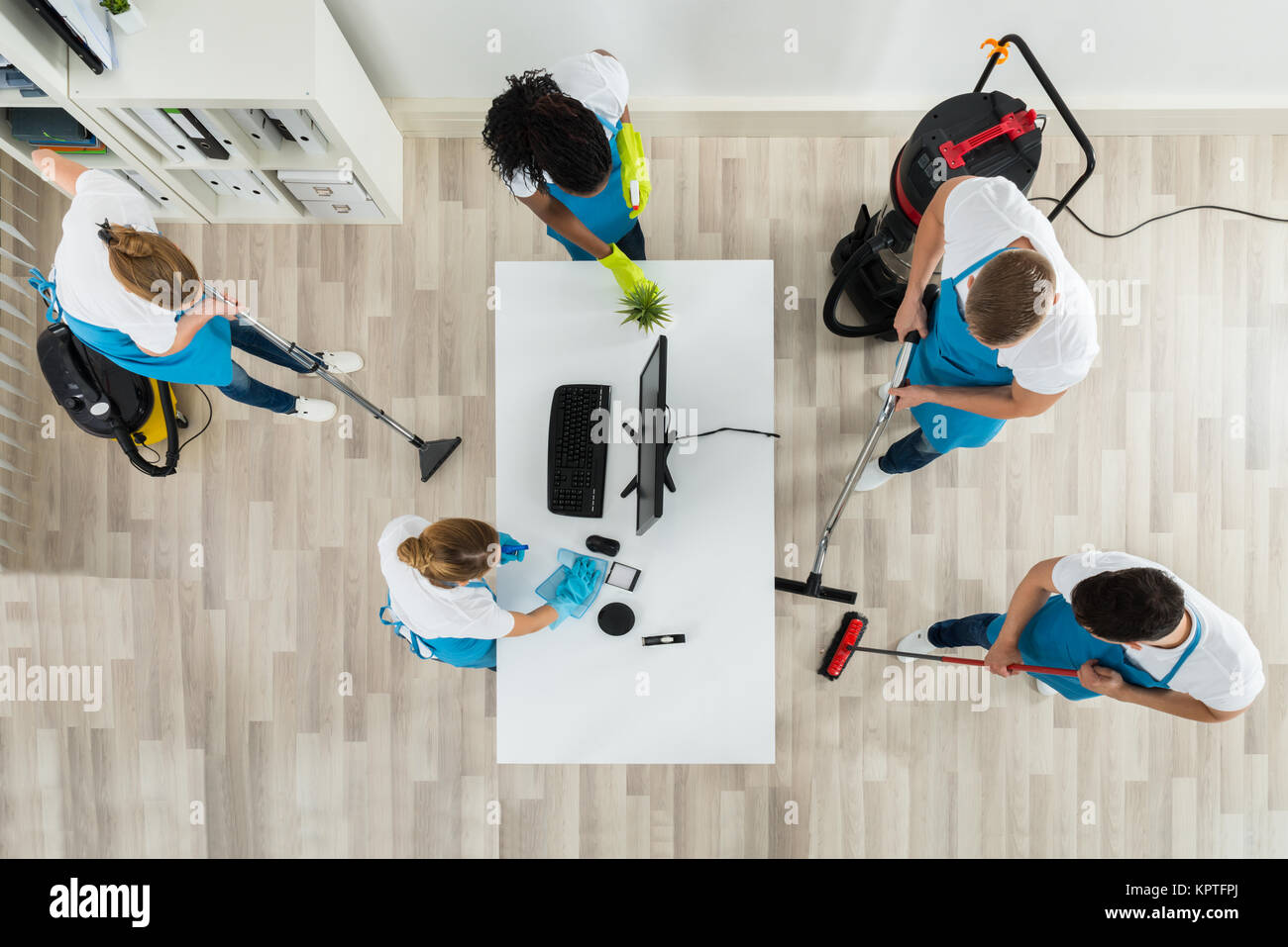Janitors Cleaning The Office With Cleaning Equipments Stock Photo Alamy