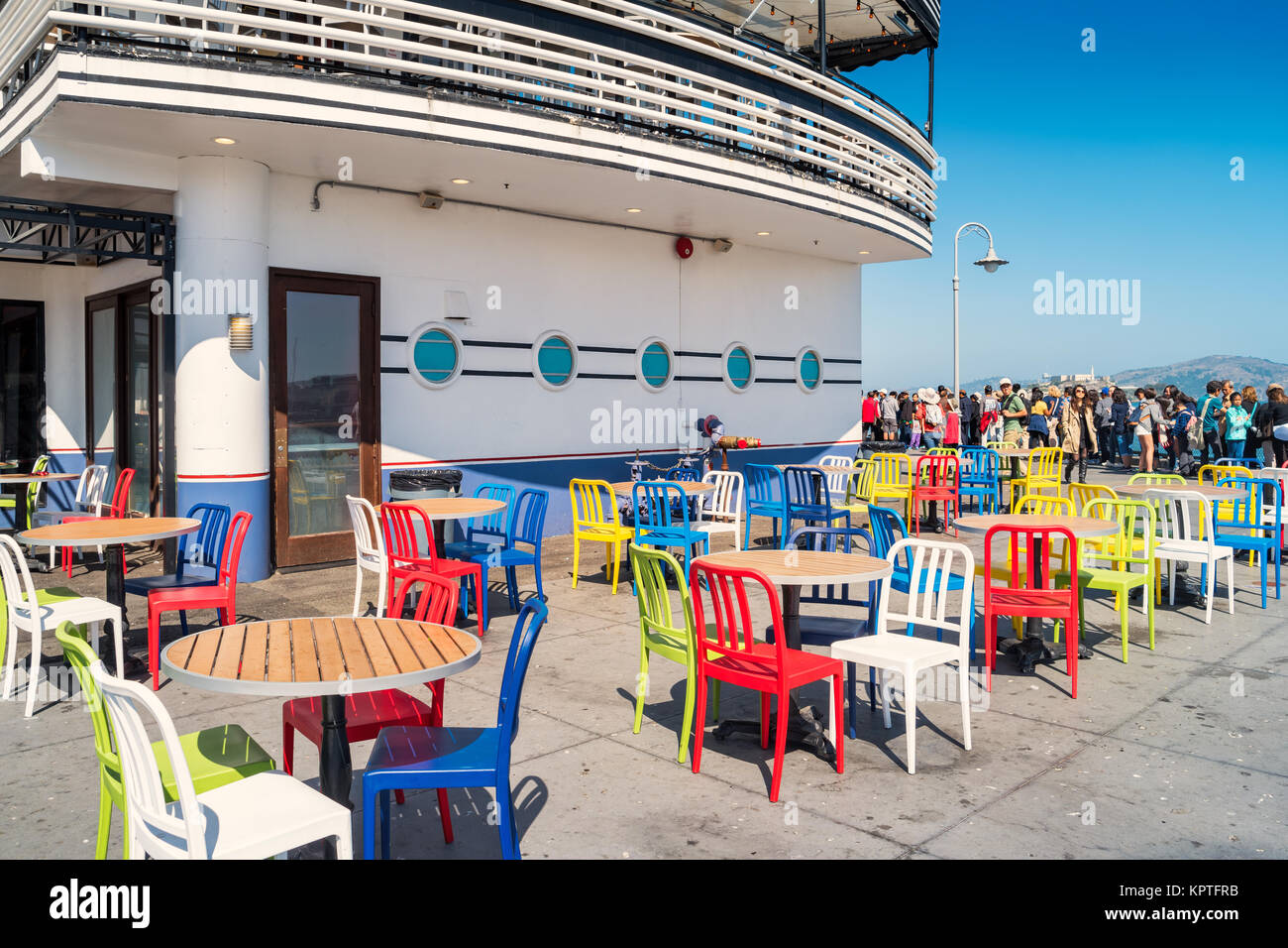 Restaurant patio with colorful chairs at pier 45 in San Francisco