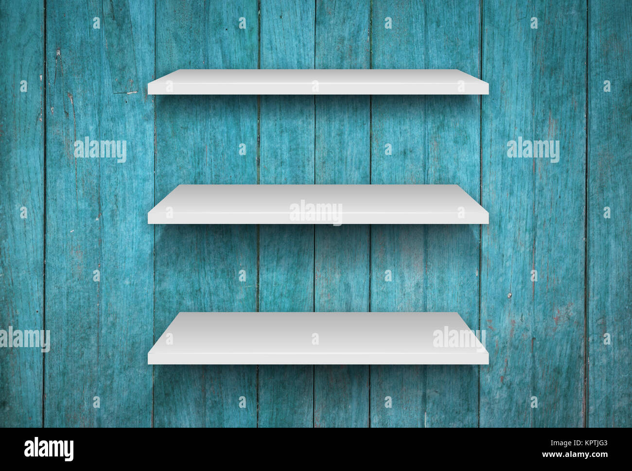 Three white shelves on blue wooden interior texture background Stock