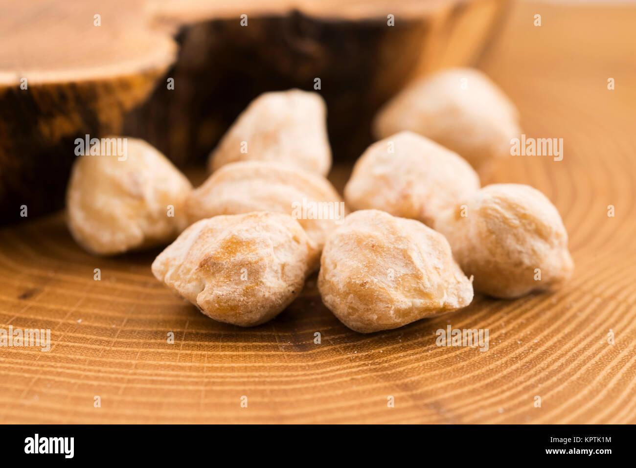 Candlenut is a spice in indonesian cuisine hires stock photography and