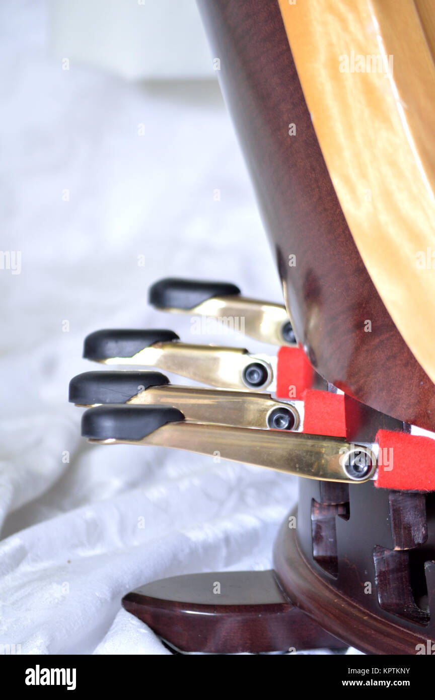 Pedals of a pedal harp Stock Photo Alamy