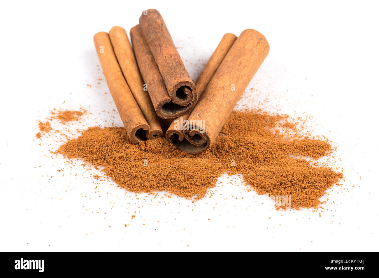 cinnamon sticks with powder Stock Photo Alamy