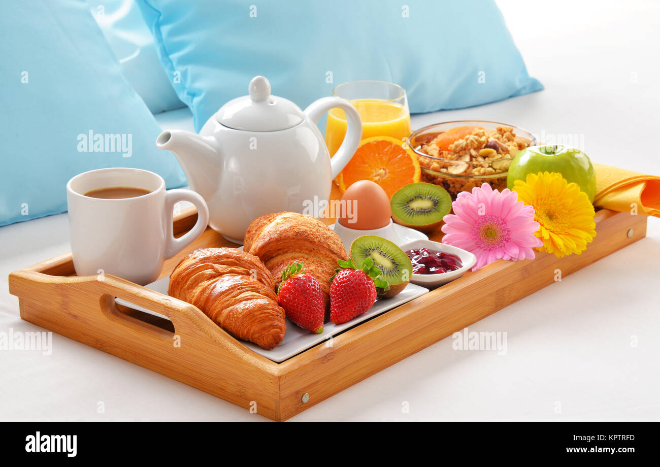 Breakfast Tray In Bed In Hotel Room Stock Photo - Alamy