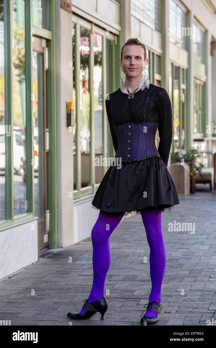 Gender fluid young man in corset and high heels Stock Photo: 168961182 ...