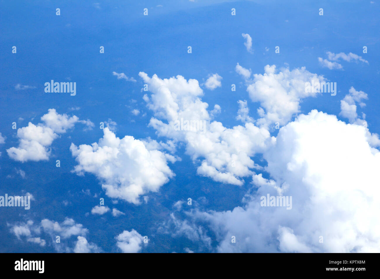 Blue sky and Clouds looking from the Airplane Stock Photo - Alamy