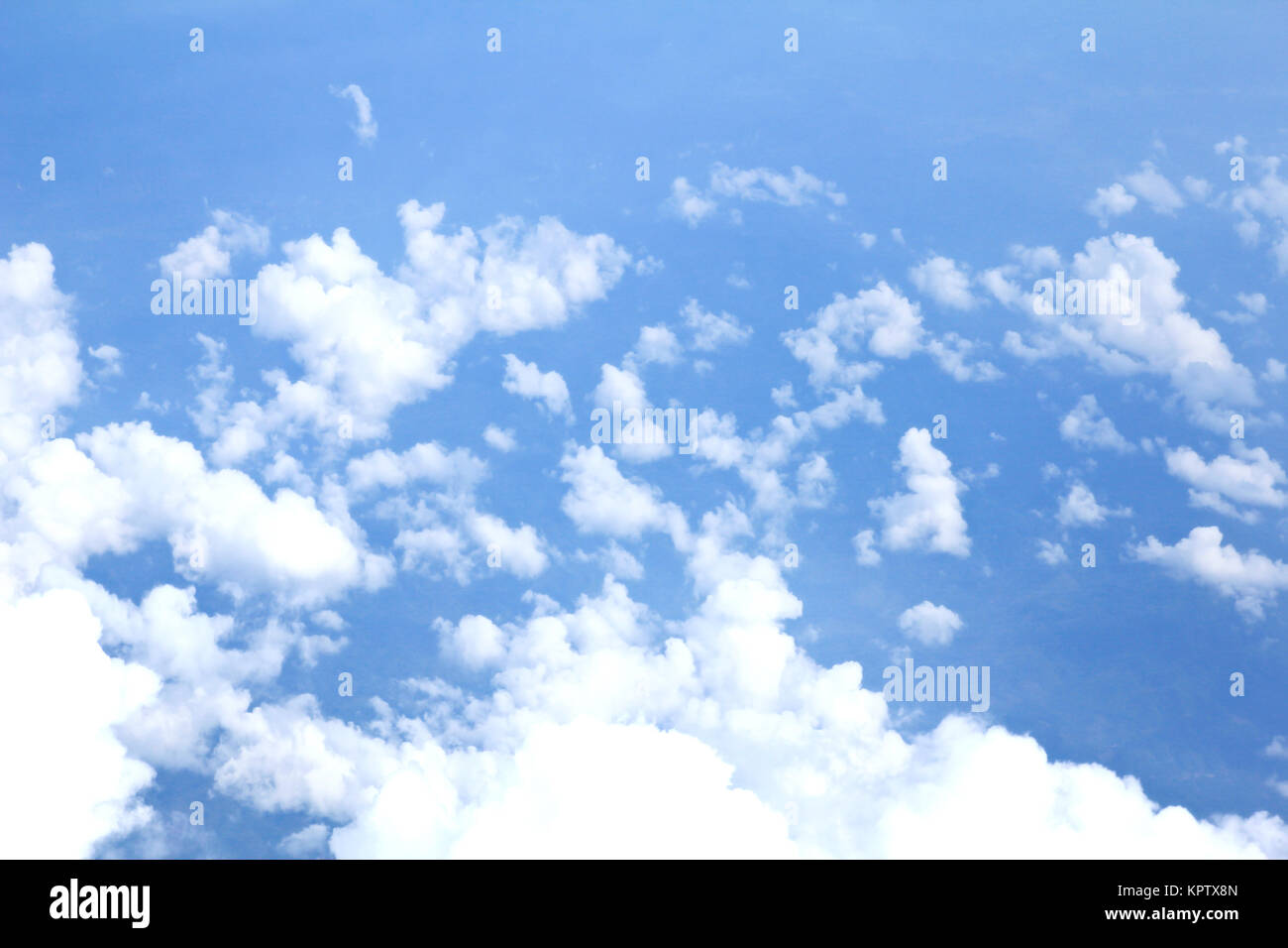 Blue sky and Clouds looking from the Airplane Stock Photo - Alamy