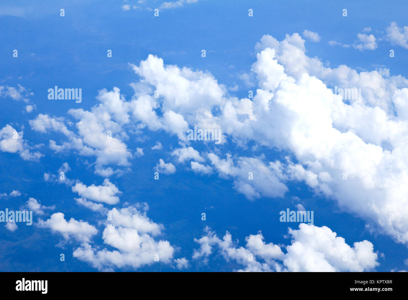 Blue sky and Clouds looking from the Airplane Stock Photo - Alamy