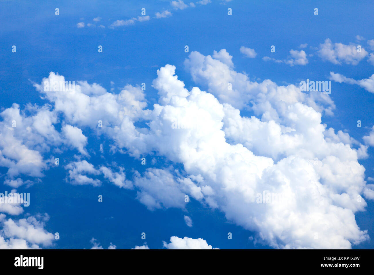 Blue sky and Clouds looking from the Airplane Stock Photo - Alamy