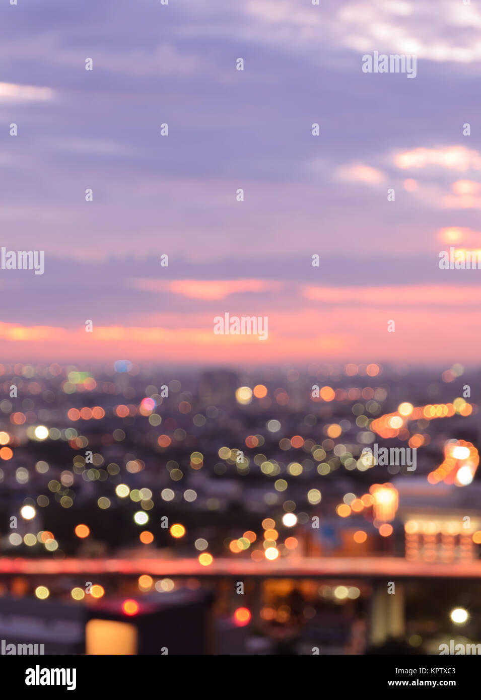 Aerial view of city skyline at twilight. Blur cityscape background ...
