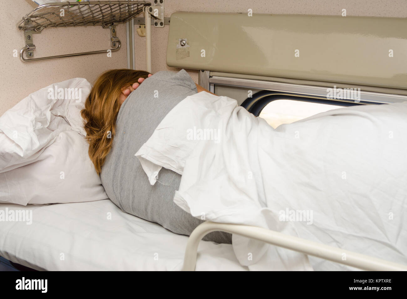 Girl sleeping on train hi-res stock photography and images - Alamy