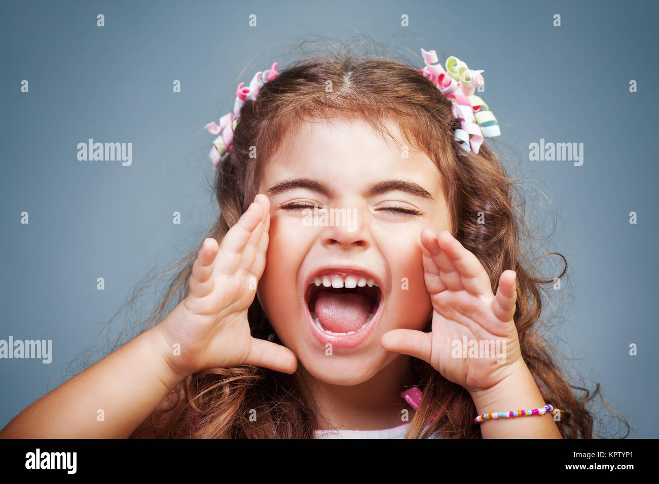 Little girl screaming Stock Photo
