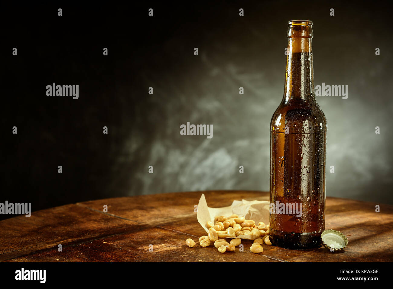 Download Profile View Of Cold Bottle Of Beer Covered In Condensation On Rustic Stock Photo Alamy PSD Mockup Templates