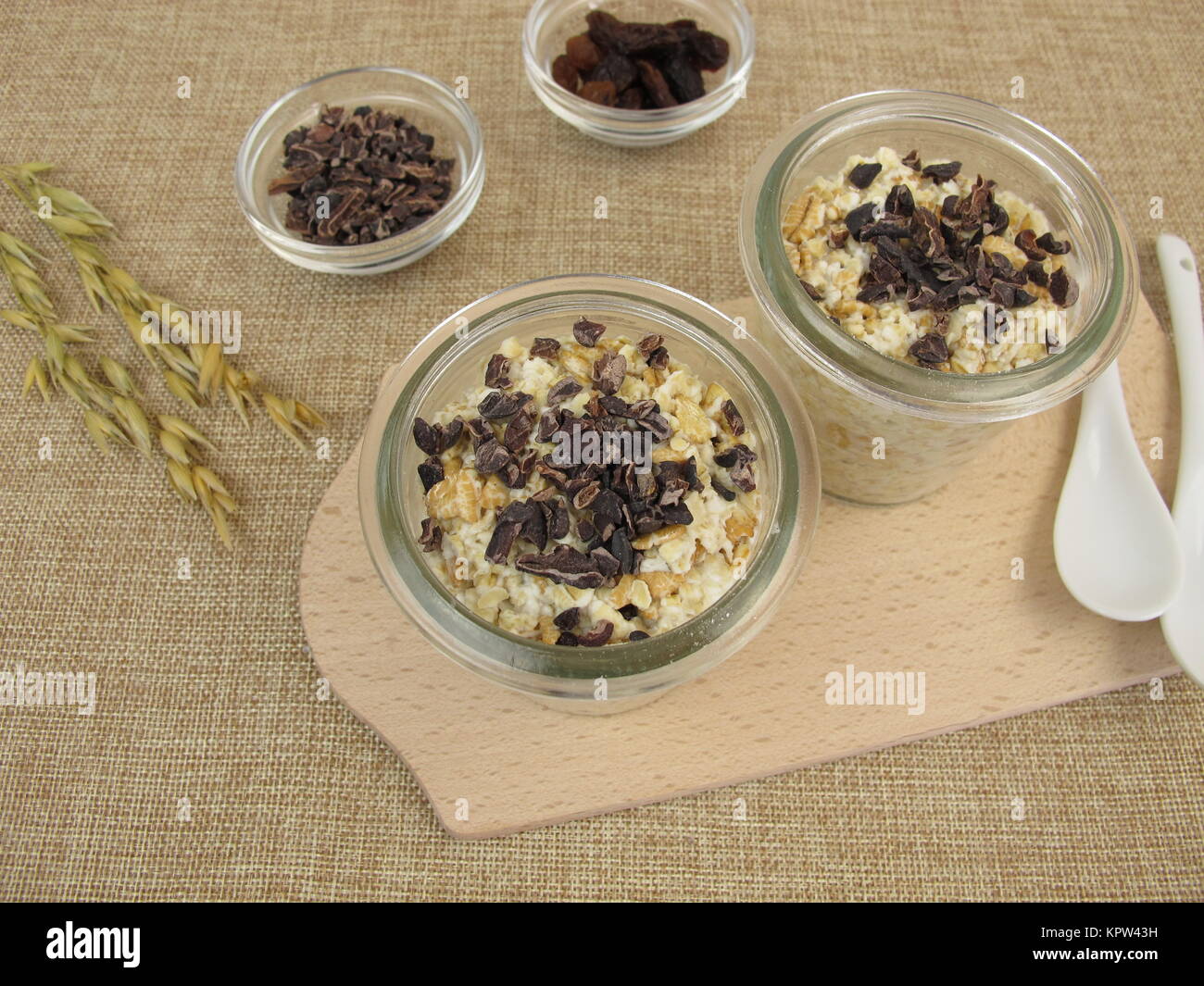 overnight oats with cocoa nibs and sultanas Stock Photo