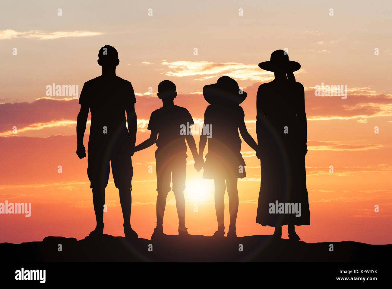 Sunset On The Beach Stock Photo - Alamy