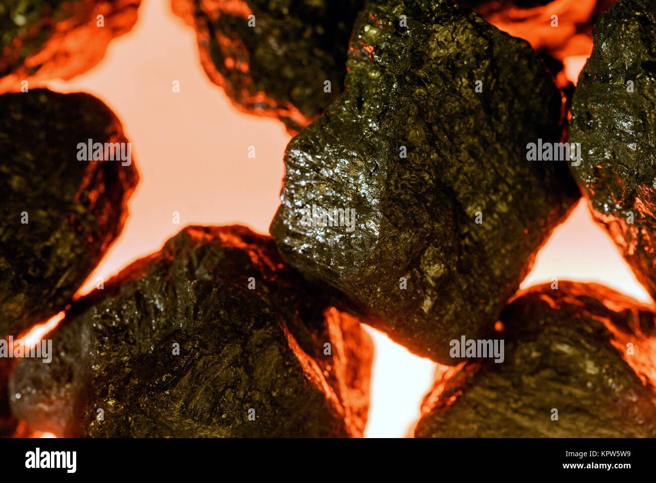Black Artificial Black Coal And Coke Burning On A Fake Fire In A