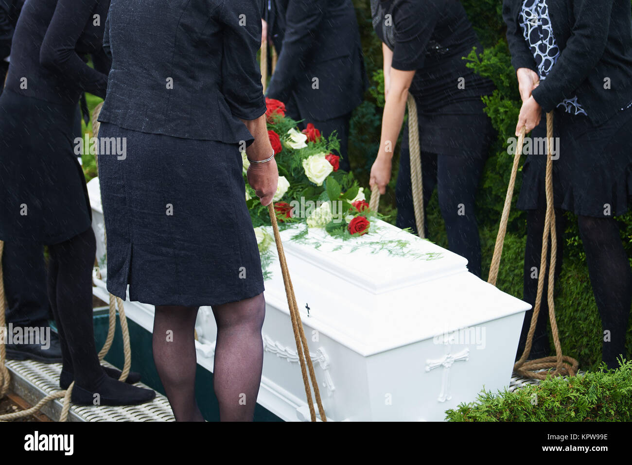 Lowering casket hi-res stock photography and images - Alamy