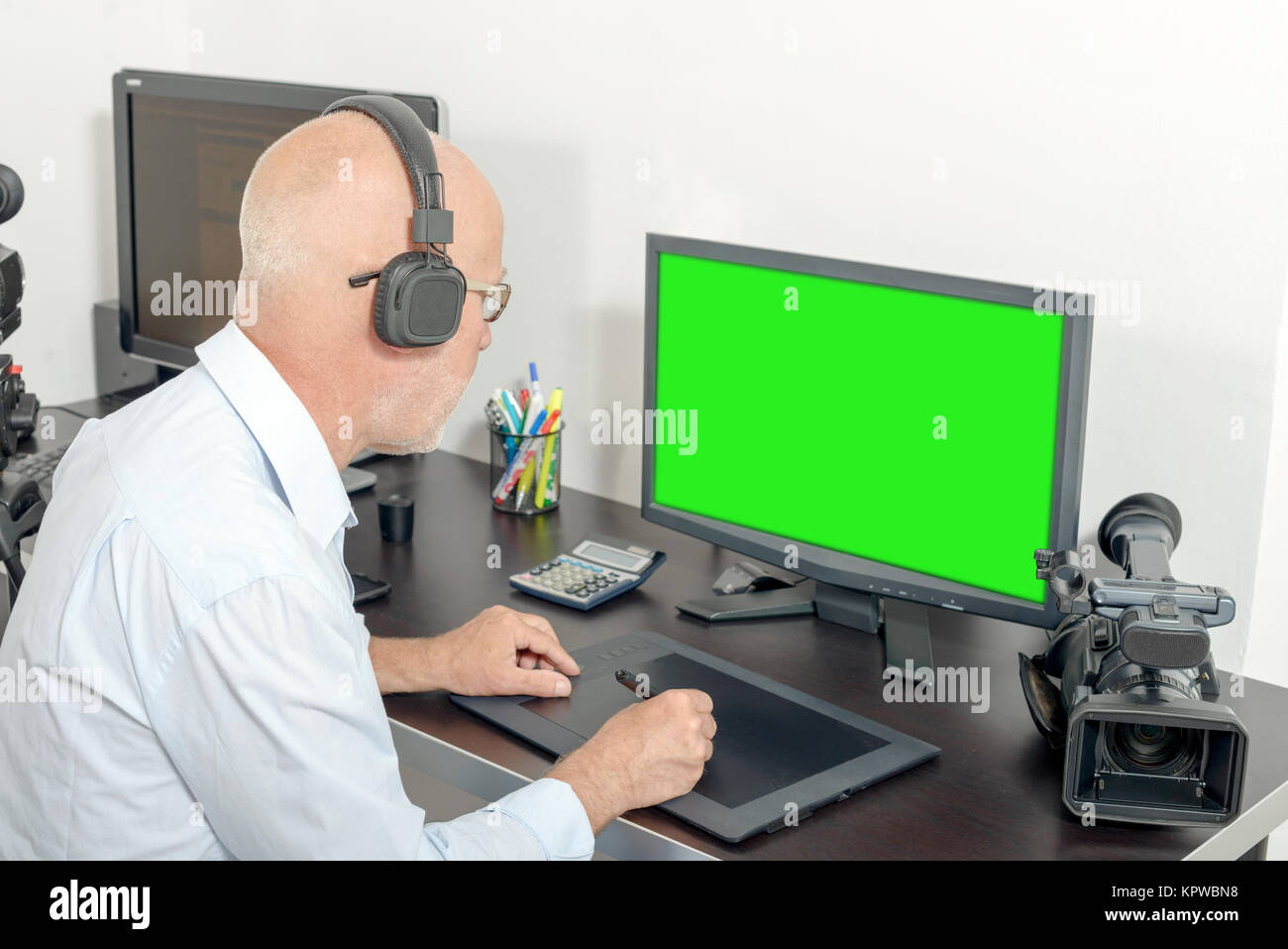 video editor in his studio Stock Photo Alamy
