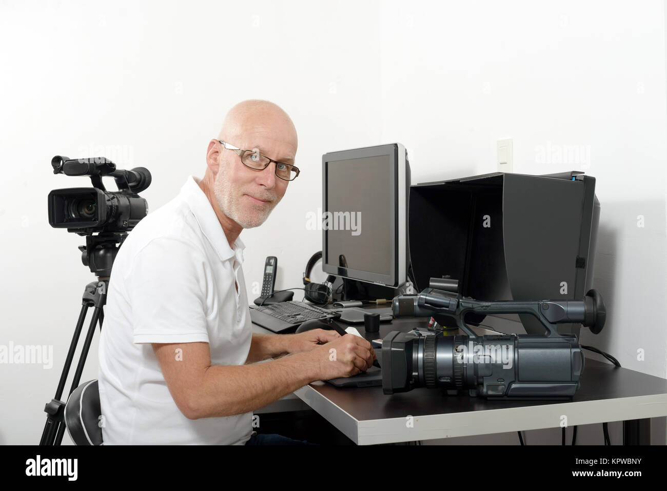 video editor in his studio Stock Photo Alamy