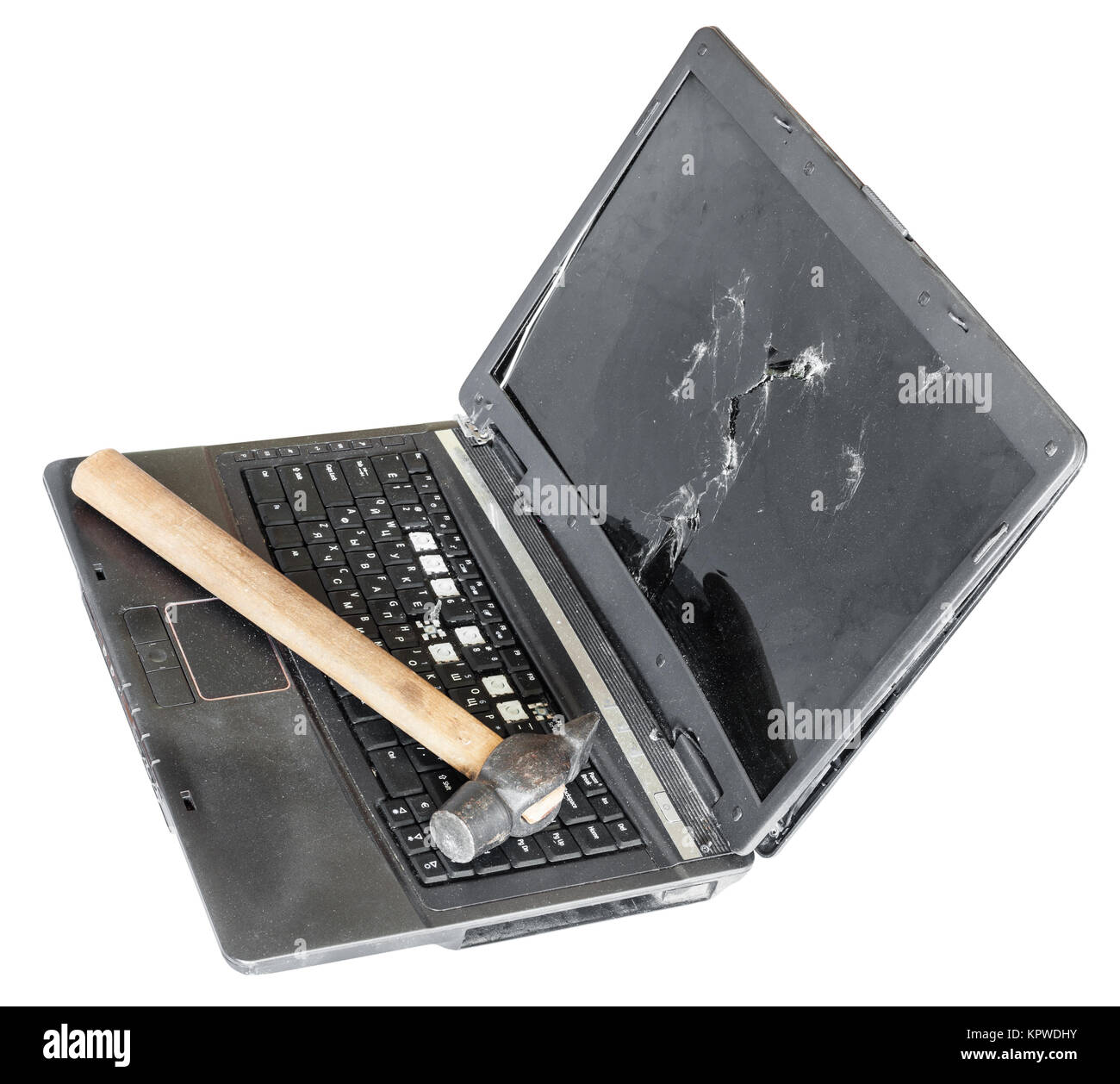 old broken laptop with hammer on keyboard Stock Photo Alamy