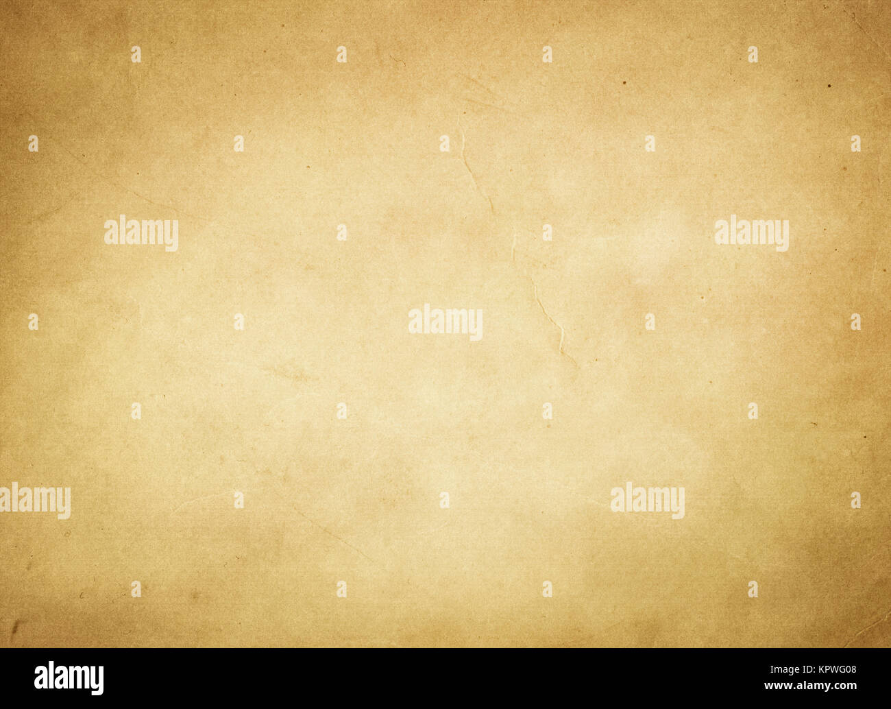 Aging paper background. Natural old paper texture for the design. Stock Photo