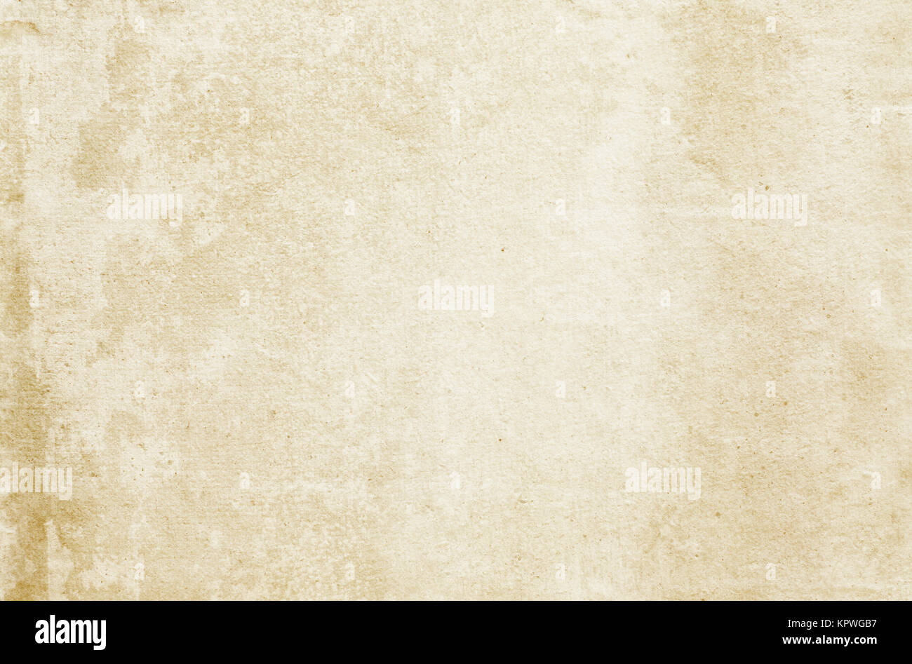 Aging stained paper background. Natural paper texture for the design. Stock Photo