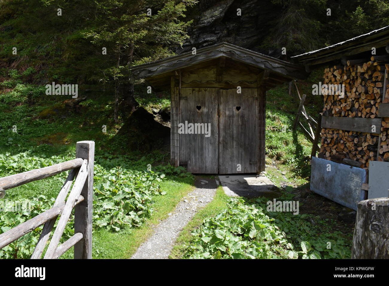 Â toilet,toilet cabin,toilet cottage,alm,mountain,public toilets,wooden cabin,outhouse Stock Photo