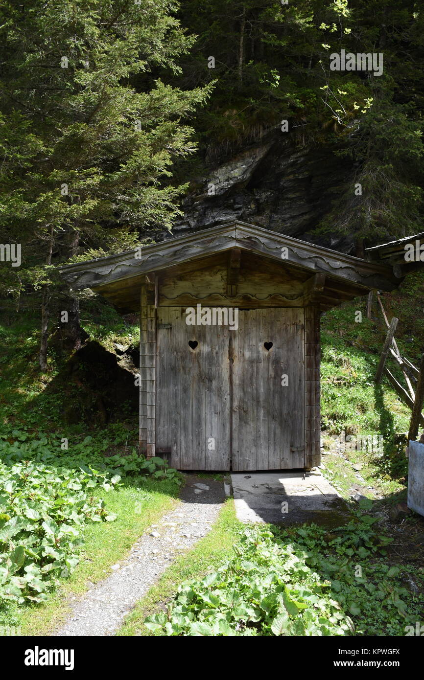 Â toilet,toilet cabin,toilet cottage,alm,mountain,public toilets,wooden cabin,outhouse Stock Photo