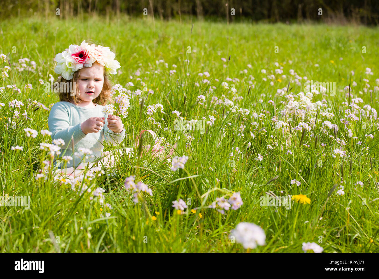 Clara picking the flowers