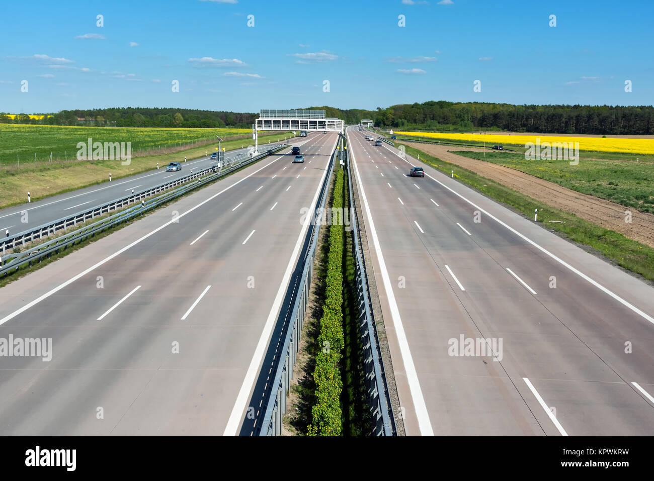 a highway in germany with little traffic on a sunny day Stock Photo