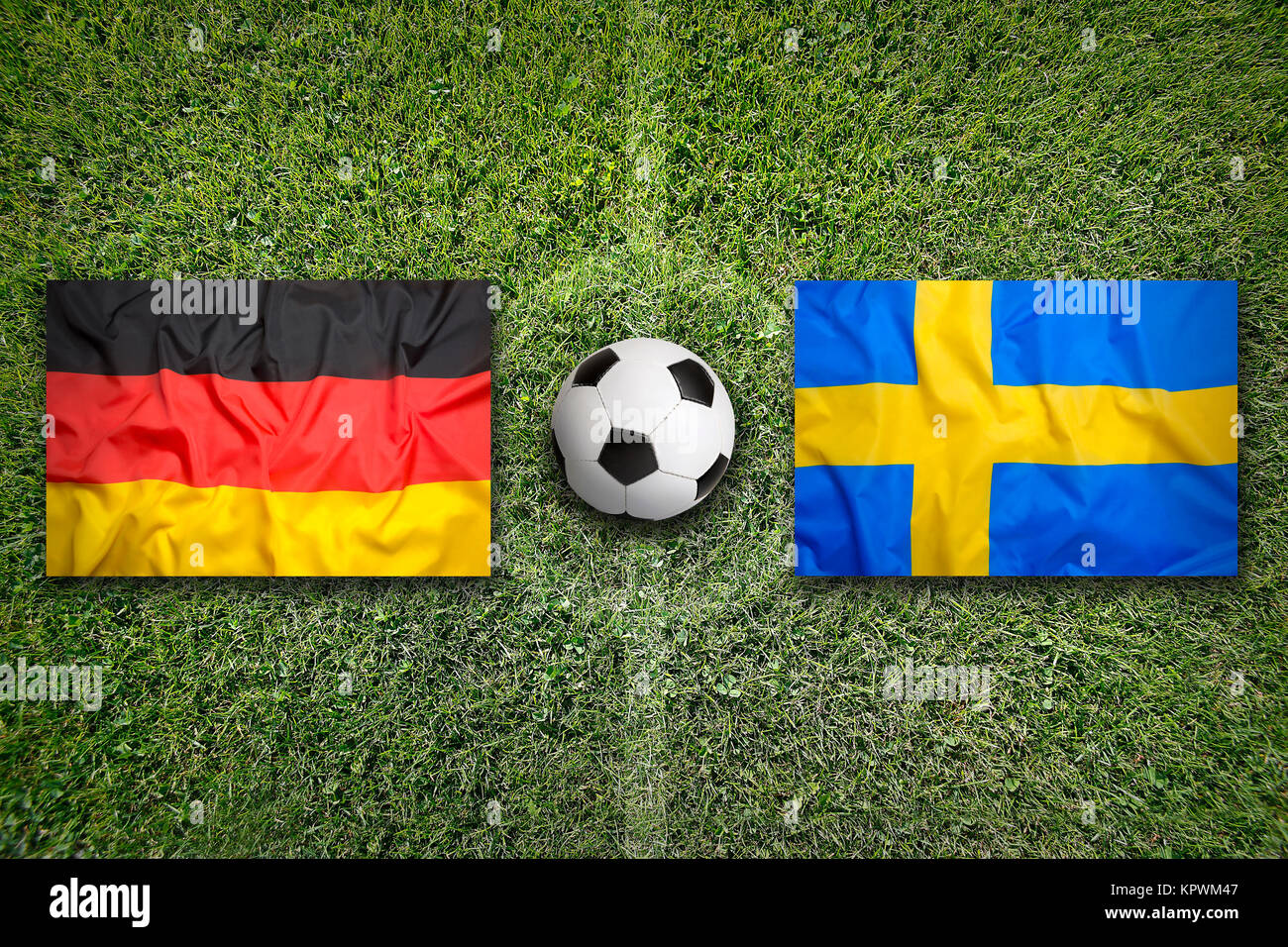 Germany vs. Sweden flags on soccer field Stock Photo Alamy