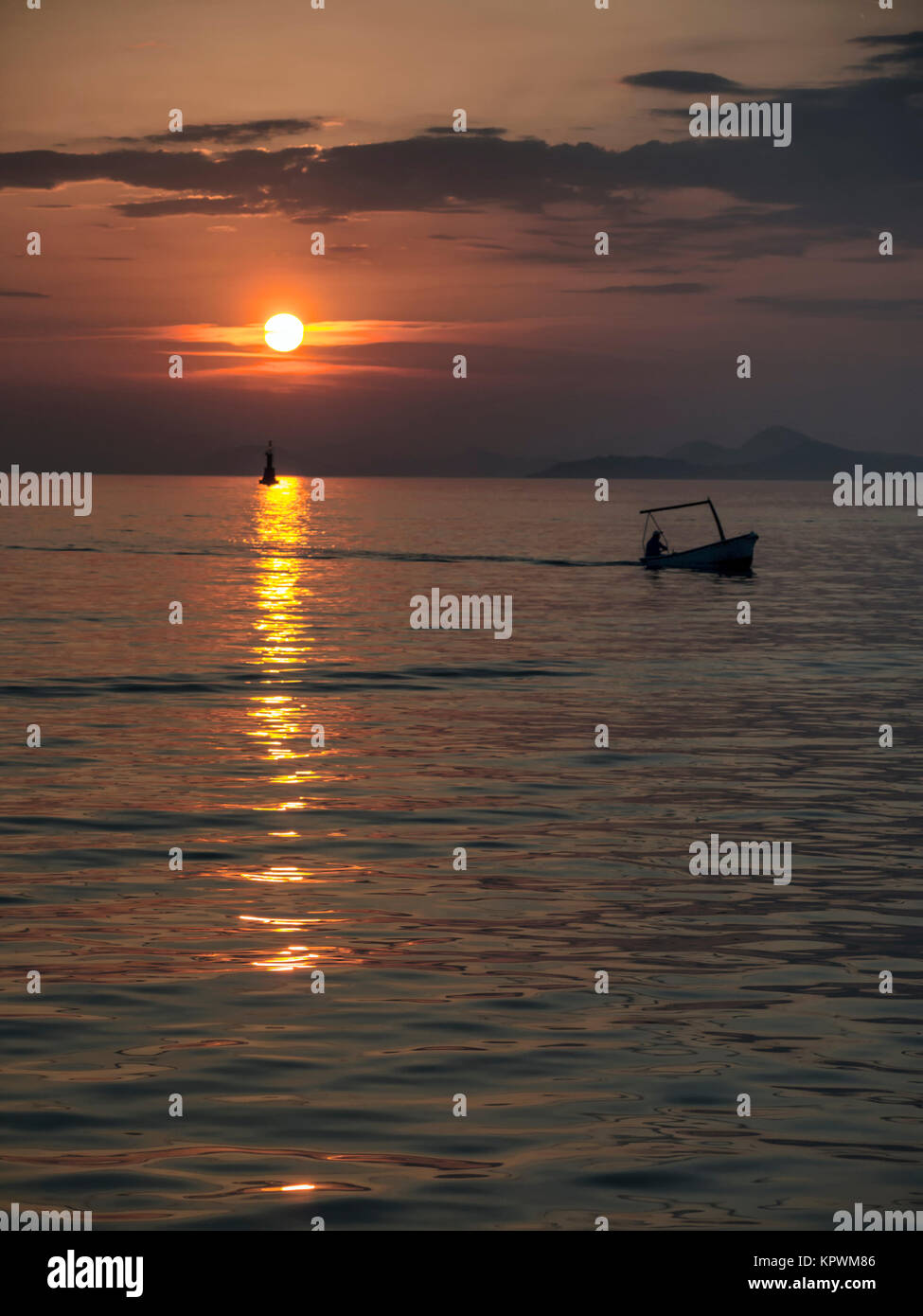Silhouette of fisherman at the sunset Stock Photo - Alamy