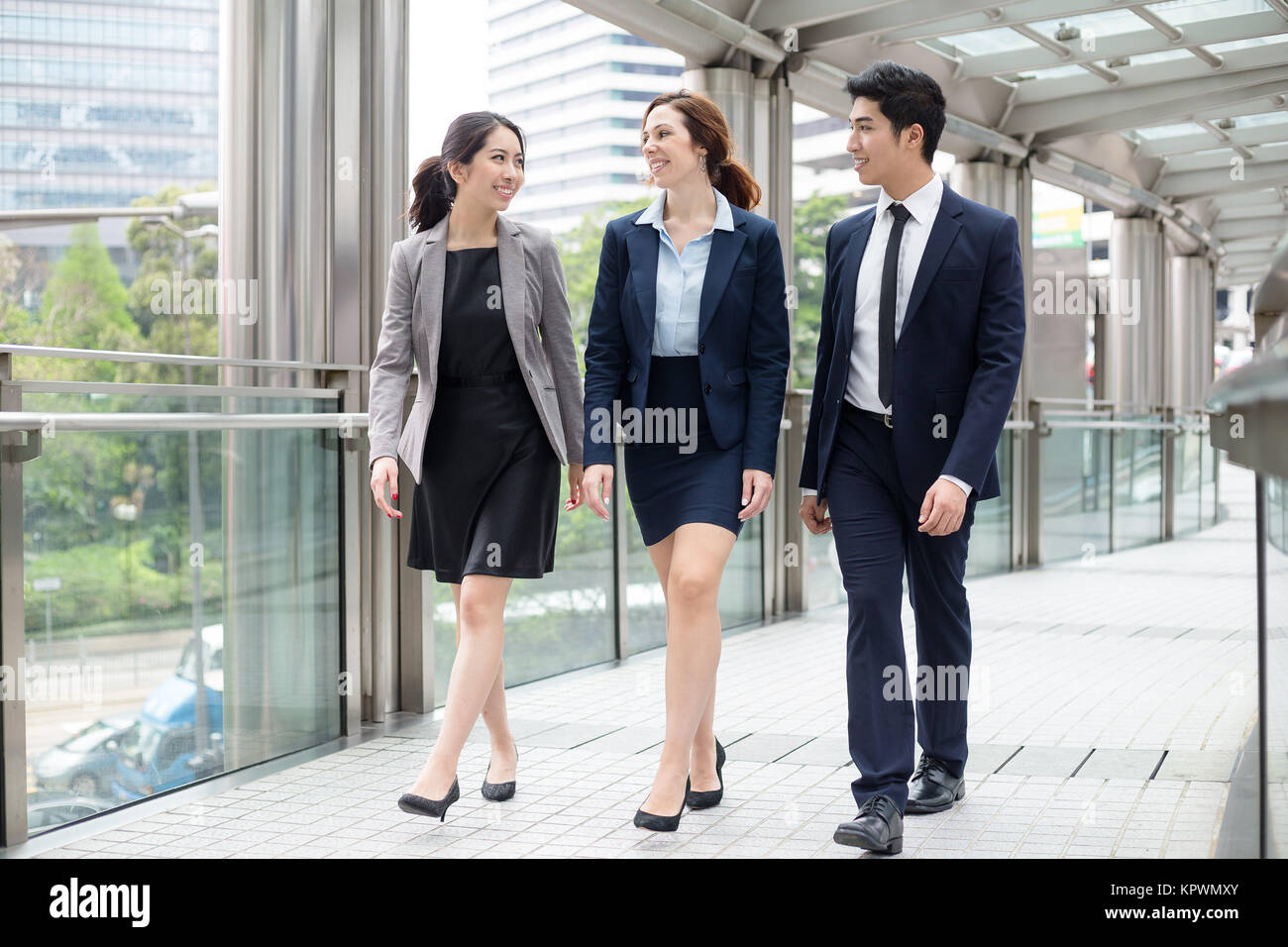 Business people walking at outdoor Stock Photo - Alamy