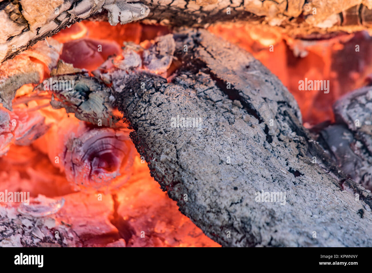 Close-up of the burning embers in the wood fire Stock Photo