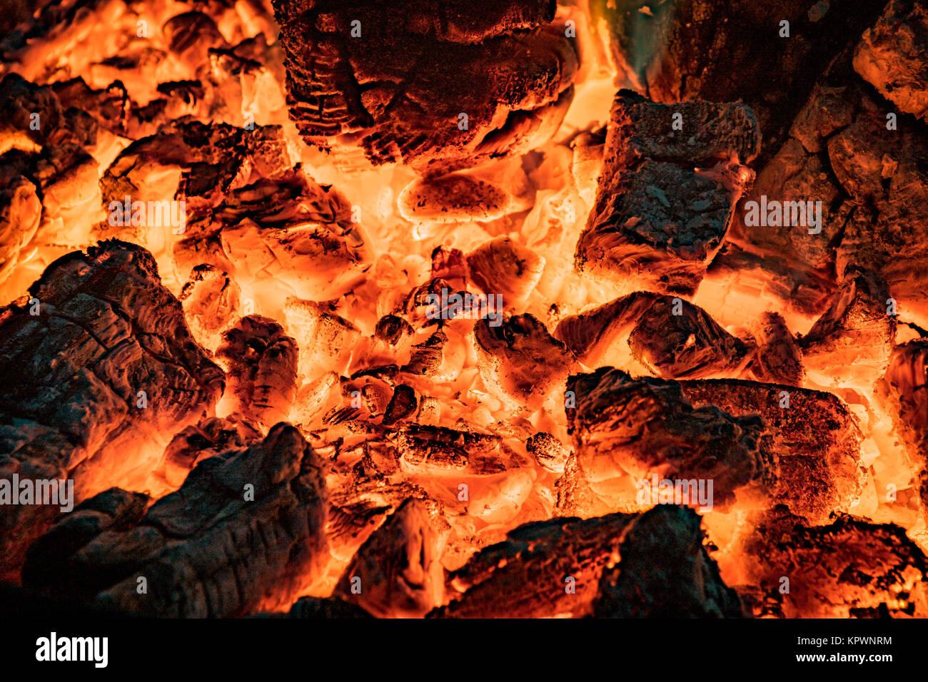 wood fire -burning embers in closeup Stock Photo