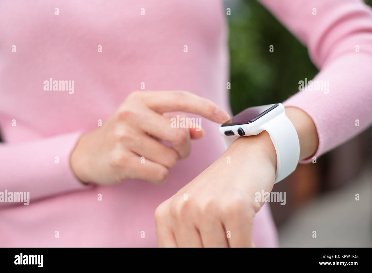 Woman use of smart watch Stock Photo Alamy